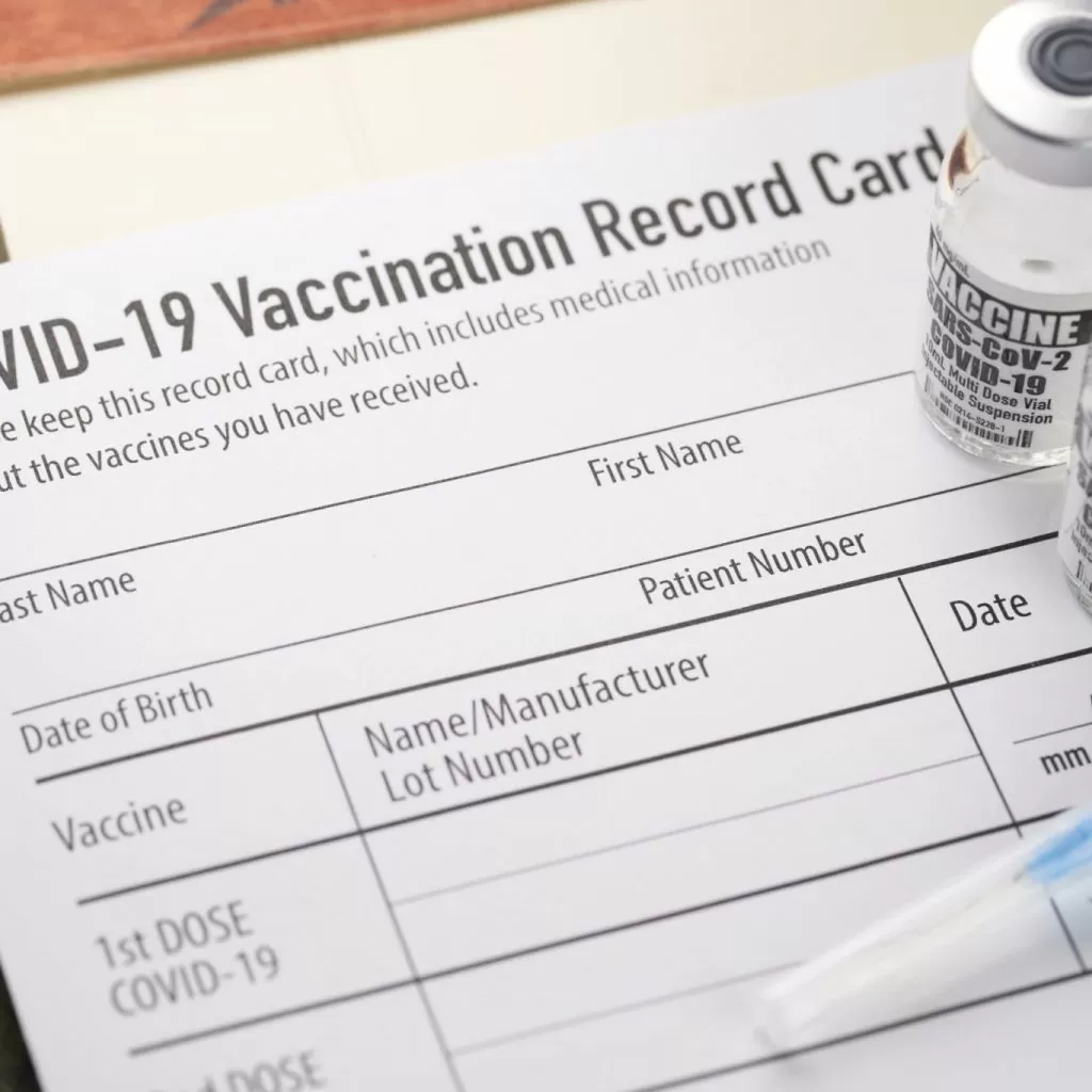 Covid-19 vaccination record card with vials and syringe, Article 92.