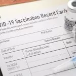 Covid-19 vaccination record card with vials and syringe, Article 92.