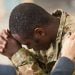 Soldier in profile sitting with his head down with therapist hand on shoulder. Hoto What happens when you are court-martialed? Can you appeal a court-martial conviction? How long does a court-martial appeal take? what should I look for in a court-martial appeal attorney?