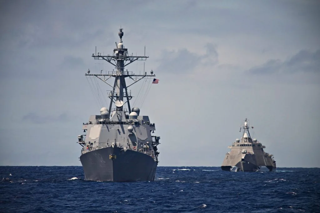US Naval Ships sailing in formation; sexual harassment investigation authority; sexual harassment is now a crime